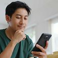 asian man mobile phone
